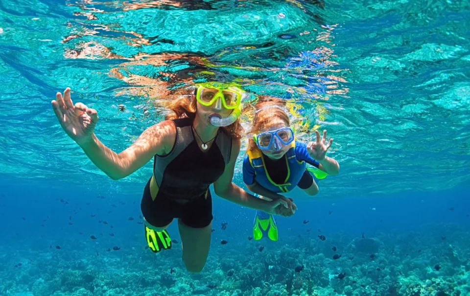 A mother and daughter snorkelling at Tunku Abdul Rahman Park