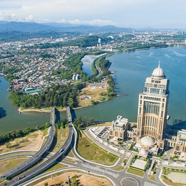 Aerial view of Kota Kinabalu city centre and surrounding landscape- feature image for Kota Kinabalu Travel Guide Blog