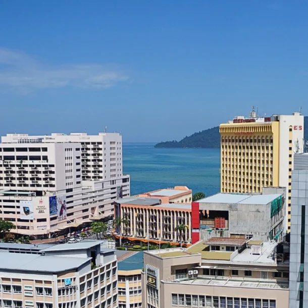top view of Kota Kinabalu city showing the waterfront skyline and urban area- feature image for explore kota kinabalu page